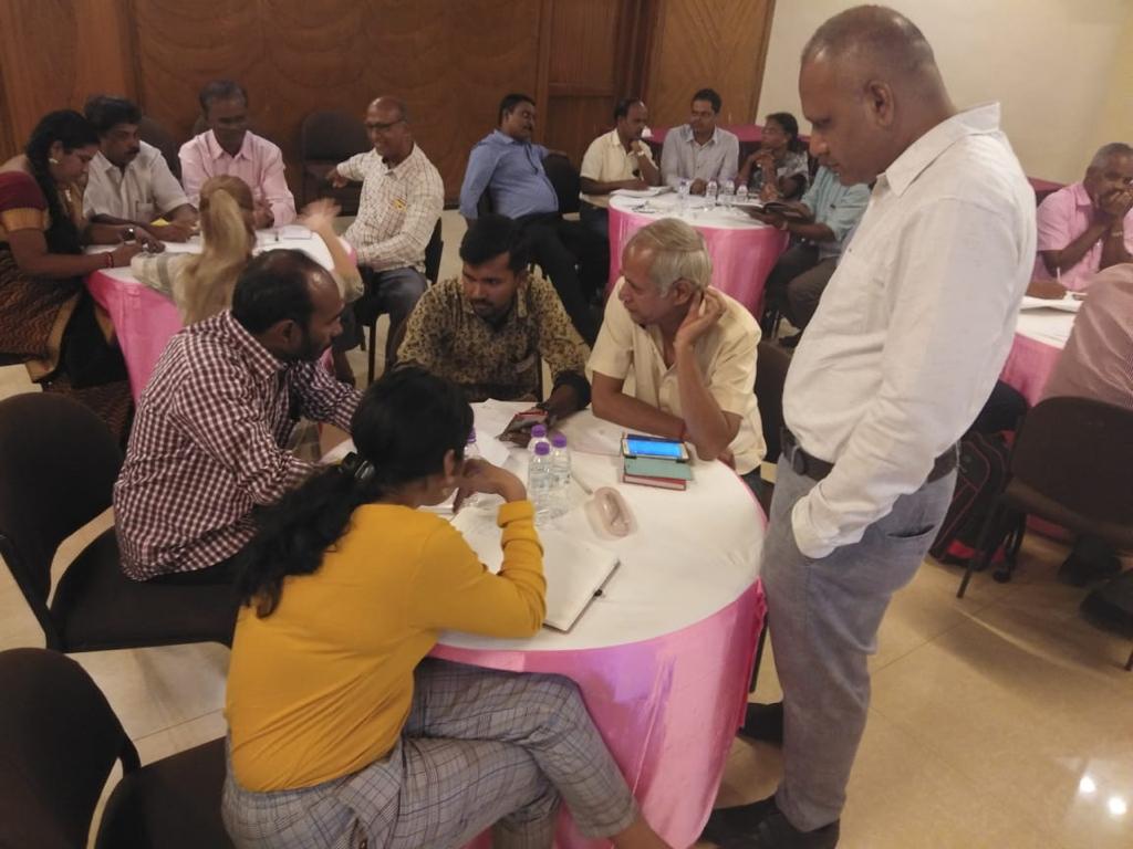 Photo of workshop participants in a group discussion